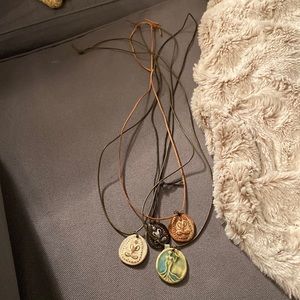 Long. Can be tied to any length. Set. Clay and leather.